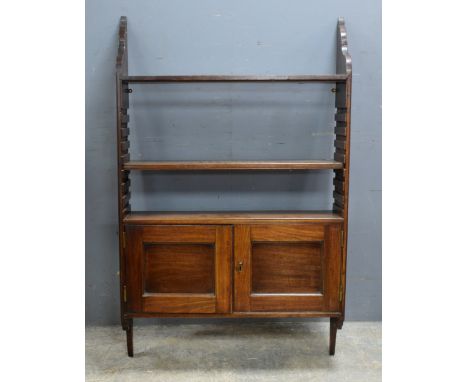 19th century mahogany adjustable wall shelf, two cupboard doors to base, 124 x 78 cm .     .     