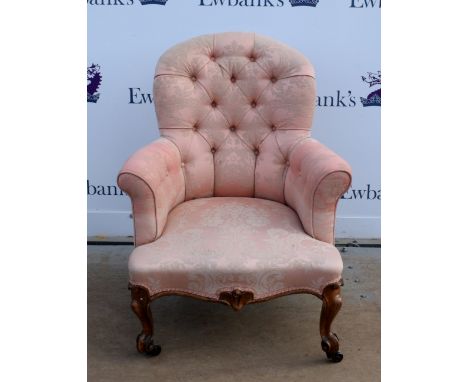 19th Century rosewood  button back armchair on carved supports..     .     