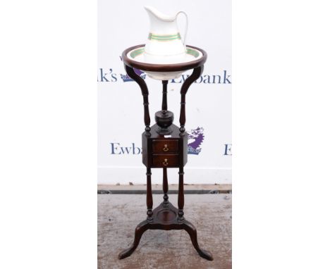 19th century mahogany wash stand, with porcelain ewer and basin with green and gilt decoration, above centre section with two