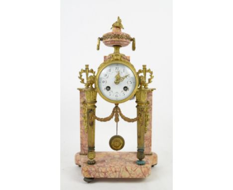 19th century French gilt-metal and pink marble mantle clock, with two train movement striking on a bell, 40 cm x 22 cm.     .