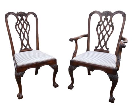 Set of eight (6+2) early 20th Century Chippendale style mahogany dining chairs with carved pierced backs, drop in seats on ca