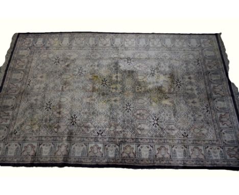 Indian silk carpet  with repeating medallions 283cm x 172cm  .     .     