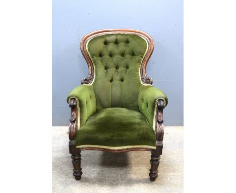 Victorian rosewood framed button backed armchair with carved back rail and arms on turned and carved supports, .     .     