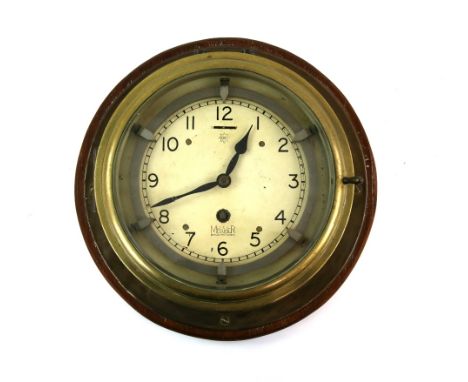 Mercer ships brass clock, enamelled dial with Arabic numerals and outer ring,.     .     