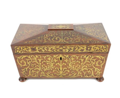 19th Century rosewood and brass inlaid tea caddy, the hinged cover enclosing bowl and two compartments, on bun feet - 33 cm w