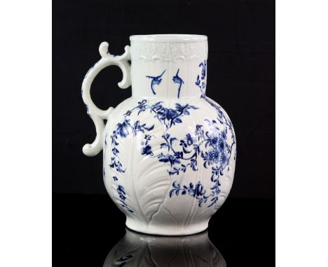 18th century English porcelain jug with underglaze blue floral  pattern with birds, on moulded cabbage leaf decoration, produ