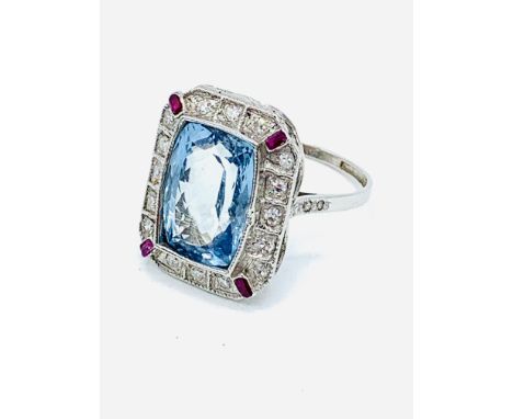 White gold large aquamarine, ruby and diamond set ring, aquamarine 14 x 10 mms, size Q. estimate £1,200-1,400