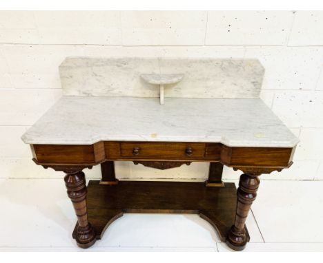 Mahogany shaped front marble top washstand with frieze drawer, shelf to base, and turned front supports, 122 x 54 x 96cms. Es