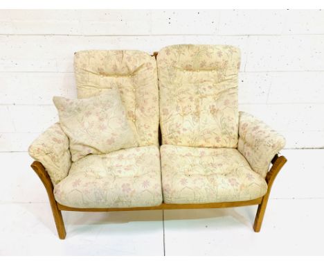 Ercol two seat sofa with detachable upholstered cushions, 132 x 80 x 90cms. Estimate £120-150.