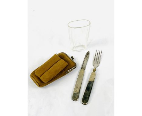 Cased campaign set of folding knife and fork and glass beaker, in leather pouch. Estimate £30-50