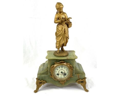French onyx mantel clock, with female figure above, overall height 48 cms. Estimate £30-50