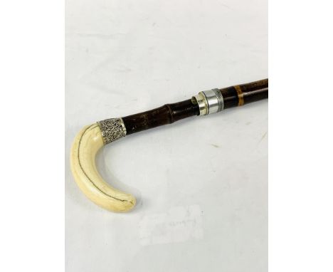 Bamboo walking stick, in two parts, with bone handle and hallmarked silver decorative ferrule engraved L P Luckham, Salisbury