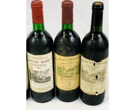 Six bottles of red wine: two 1986 Chateau Carbonnieux (Graves) Grand Cru Classe Chateau bottled; one 1978 Chateau Carbonnieux