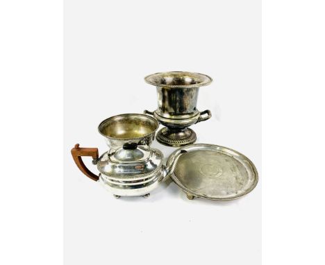 Quantity of flatware, together with silver plate items including a wine cooler; teapot; trays and bowls. Estimate £30-50.