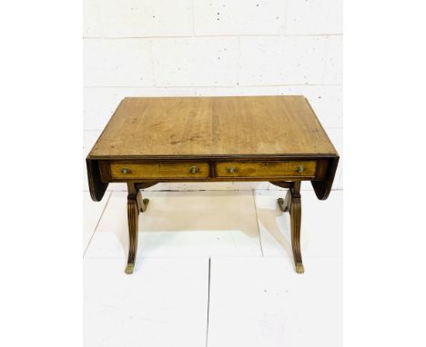 Mahogany sofa table with drop leaves, and two frieze drawers, 151 x 65 x 72cms. Estimate £30-50.