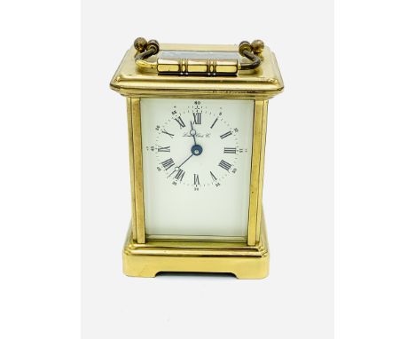 Brass cased carriage clock by The London Clock Company, with French movement, going, height 15 cms. Estimate £40-60