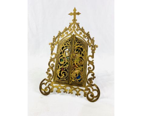Very decorative gilt brass framed religious icon containing an enamel on porcelain portrait of Madonna and child, 8 x 18cms. 