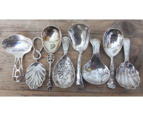 A collection of eight silver caddy spoons comprising; James Edward Barry Sheffield 1967, Norton &amp; White Birmingham 1898, 