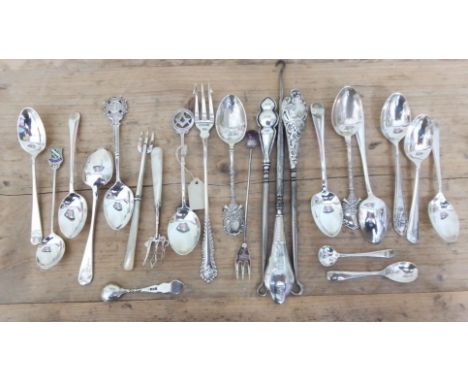 A mixed lot of hallmarked silver comprising spoons, button hooks, pickle forks, a Masonic spoon etc.  