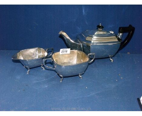 A silver three piece Teaset with a horse head hallmark and W.B. makers mark possibly from the Indian (English) colonial perio