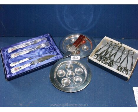 A set of six snail eaters plus snail server, hallmarked St. Medard and a pair of Aynsley fruit knife and fork.