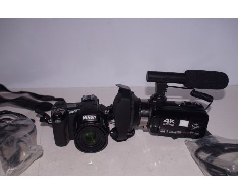 Nikon camera and a DVC recorder 