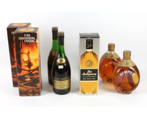 Seven bottles of spirits in include two bottles of Remy Martin Fine Champagne Cognac (both boxed), one bottle of The Antiquar