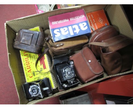 A Cased Kodak No1 Pocket Folding Camera, a Welta Compur Cased Camera, two box cameras (one in blue), atlas reflector photoflo