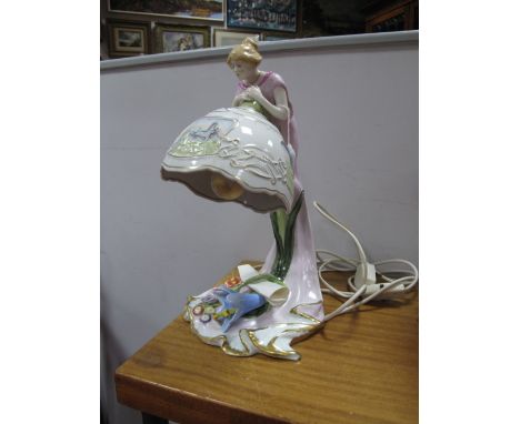 A XX Century Continental China Figural Table Lamp, in the Art Nouveau manner, with arched lady entwined with encrusted flower