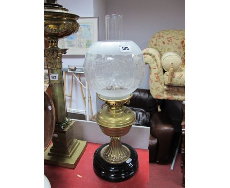 Early XX Century Brass Oil Lamp, on black circular base, with frosted glass shade. 