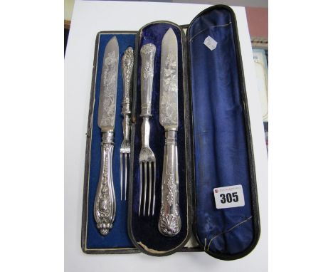 A Decorative Serving Knife and Fork, in original fitted case; together with another pair. (2) 