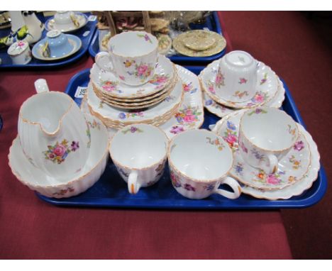 A Copeland Spode China Tea Service, printed and painted decoration of floral sprays, pattern Y 7065/40 (missing one cup), (tw