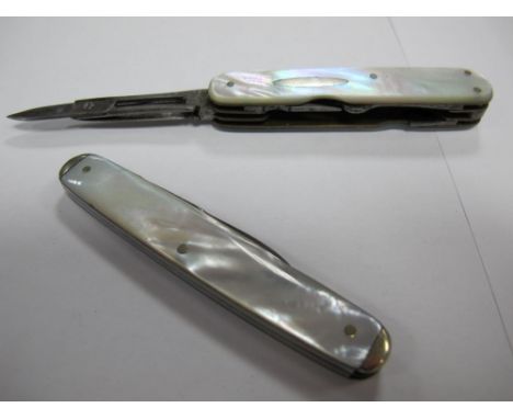 A Multi Purpose Folding Knife, including scissors and button hook, with mother of pearl scales; together with another example