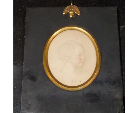 Victorian School, 1850, a portrait miniature, of a young child, watercolour, ebonised frame 