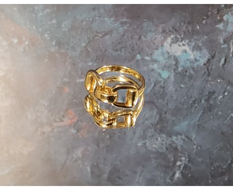 A 9ct gold 'Gucci' style stirrup ring, size L, Sheffield, 1994 5.1g (VAT on Hammer price) 