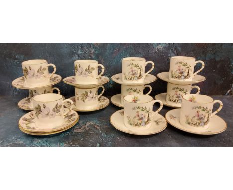A set of six Royal Worcester Watteau pattern coffee cans and saucers, printed mark;&nbsp; a set of five June Garland coffee c