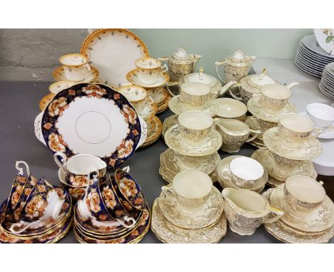 A Royal Albert Heirloom pattern tea service, for six;&nbsp; a Royal Albert Crown China tea service, for twelve, with swags, c