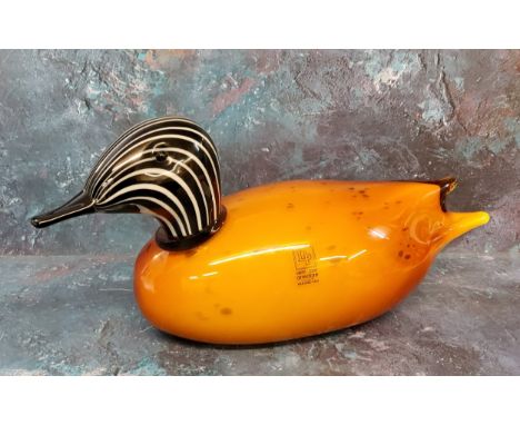 A Murano glass duck, with black and white striped head, mottled orange body, 30cm long, label Vetri per Arredare 