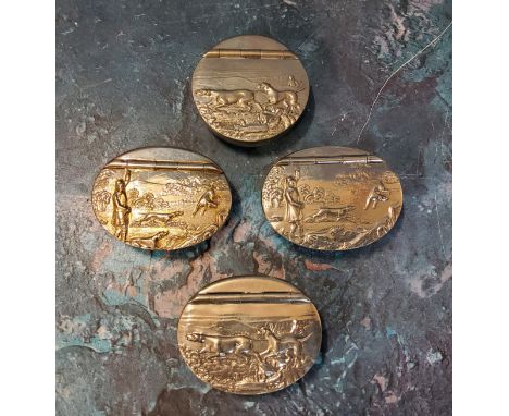 A James Dixon and Sons Cornish pewter circular snuff box, the cover embossed with hounds, 5cm diam;&nbsp; others, oval  (VAT 