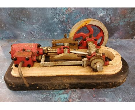An early 20th century cast iron model engine, 48cm long 