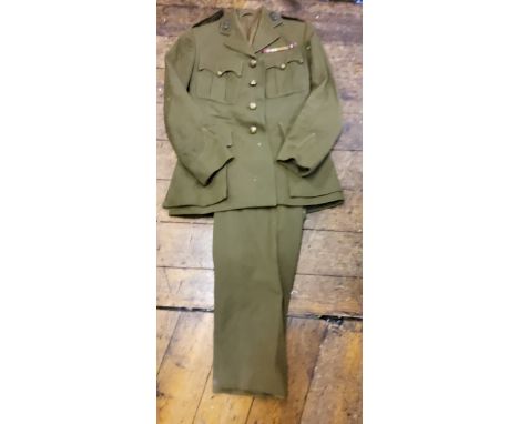 World War II - an Army uniform, Royal Regiment of Artillery buttons, the trousers retailed by Hilliers Ltd, inscribed LT R Ta