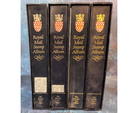 Philately - Four Royal Mail Stamp Albums by The British Post Office,&nbsp; one comprehensive, two part complete and another e