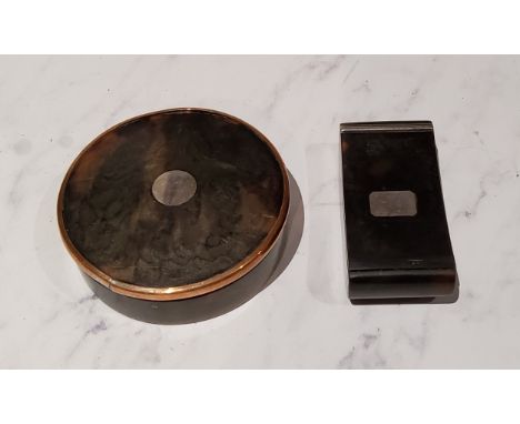 A 19th century circular tortoiseshell snuff box, gilt metal rim, 6cm diam, c.1860;&nbsp; another, bowed rectangular, 5.5cm wi