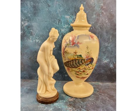A large Victorian opaque glass vases and cover, decorated with a peacock, 50cm high, c.1880;&nbsp; a composite model, Bather,