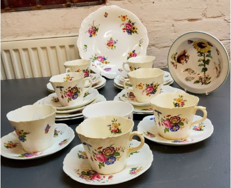 A Cauldron China tea service, comprising plates, six cups, eight saucers and side plates, decorated with flowers, pattern 730