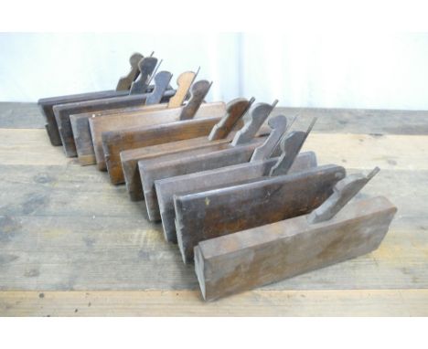 Box of ten vintage moulding planes.