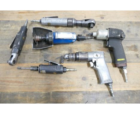 Collection of six air hose tools which include SIP driver and ratchet, and Taskmaster air cut tool.