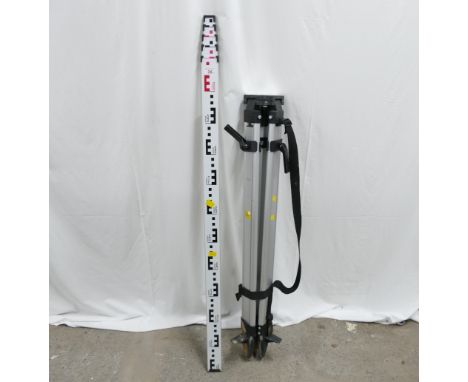 Surveyors measuring rod, 5m by 5 section and tripod.