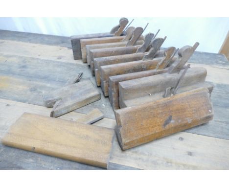 Box of eleven vintage moulding planes.