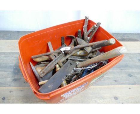 Tub of tools which includes hammers, spanners, chisels, etc.